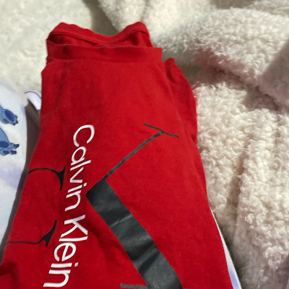 Red Calvin Klein shirt